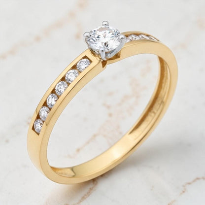 Anillo de Compromiso Solitario Oro 18k con Zircón Central y 12 Piedras Laterales en Canal | Anillo Novia L750