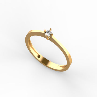 Anillo solitario ultra minimalista en oro amarillo 18K con diamante natural de 0,06ct en cuatro garras y banda plana ultra delgada – Joyería Lucigo Colombia