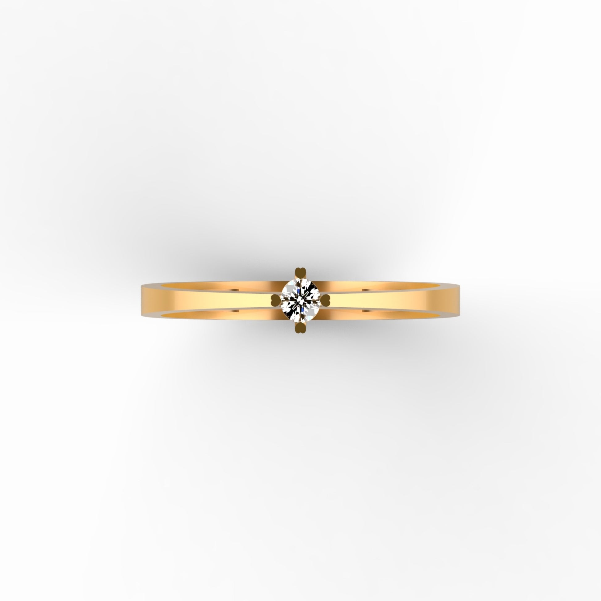 Anillo solitario ultra minimalista en oro amarillo 18K con diamante natural de 0,06ct en cuatro garras y banda plana ultra delgada – Joyería Lucigo Colombia