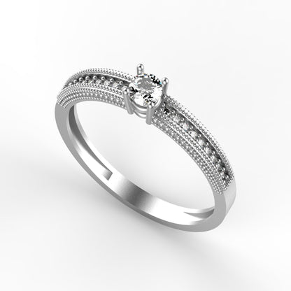 Anillo de compromiso en oro amarillo 18K con diamante natural de 0,16ct en cuatro garras y banda ancha triple milgrain con 18 brillantes en micropavé – Joyería Lucigo Colombia